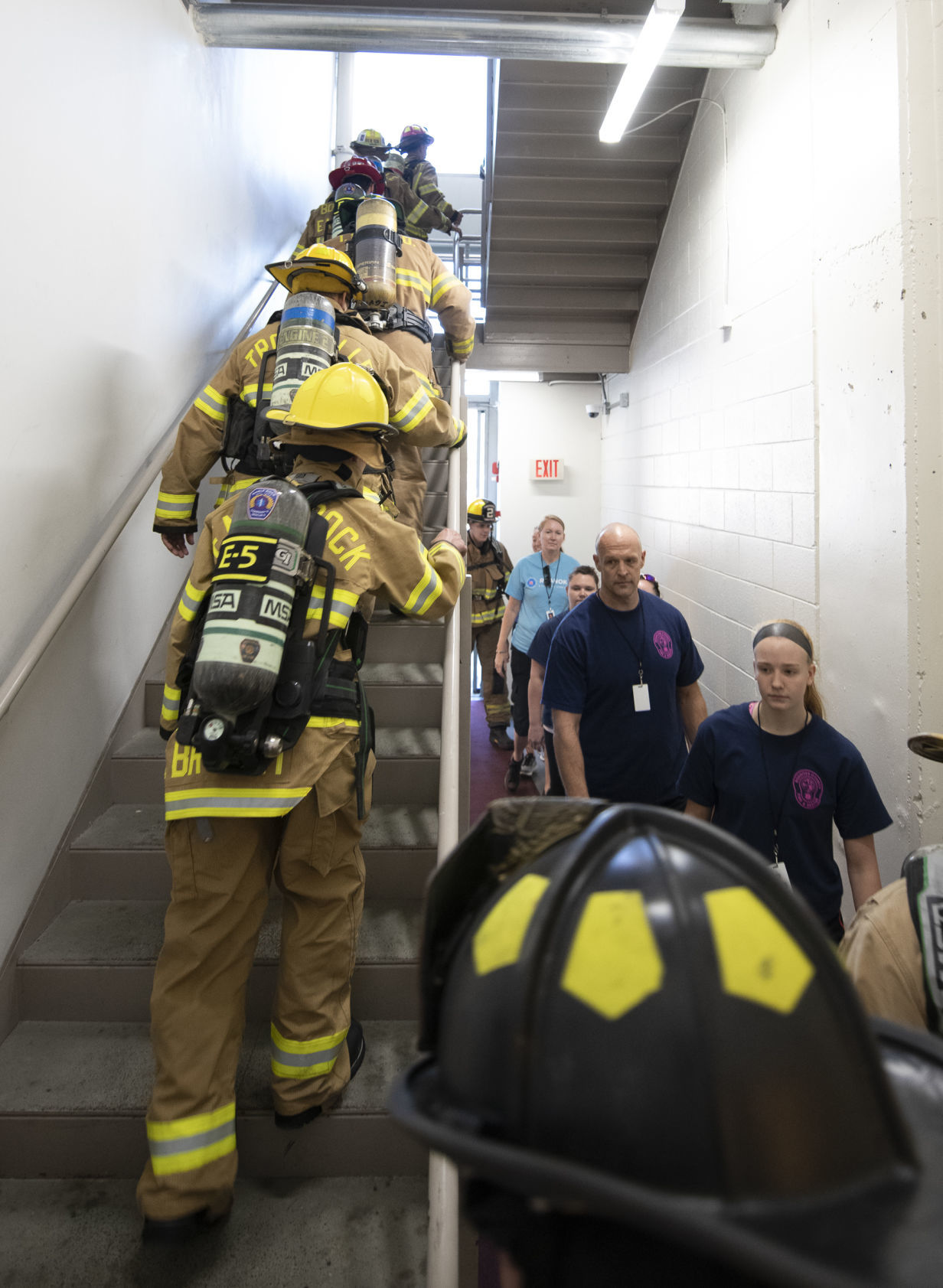 Participants start the march up the stairwell